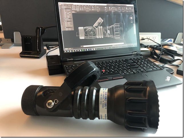 The old nozzle on my desk with the original 2D AutoCAD drawing.